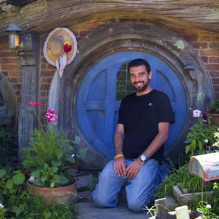 Guillaume visiting the Hobbiton village.